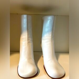 Bottega Veneta white boots.